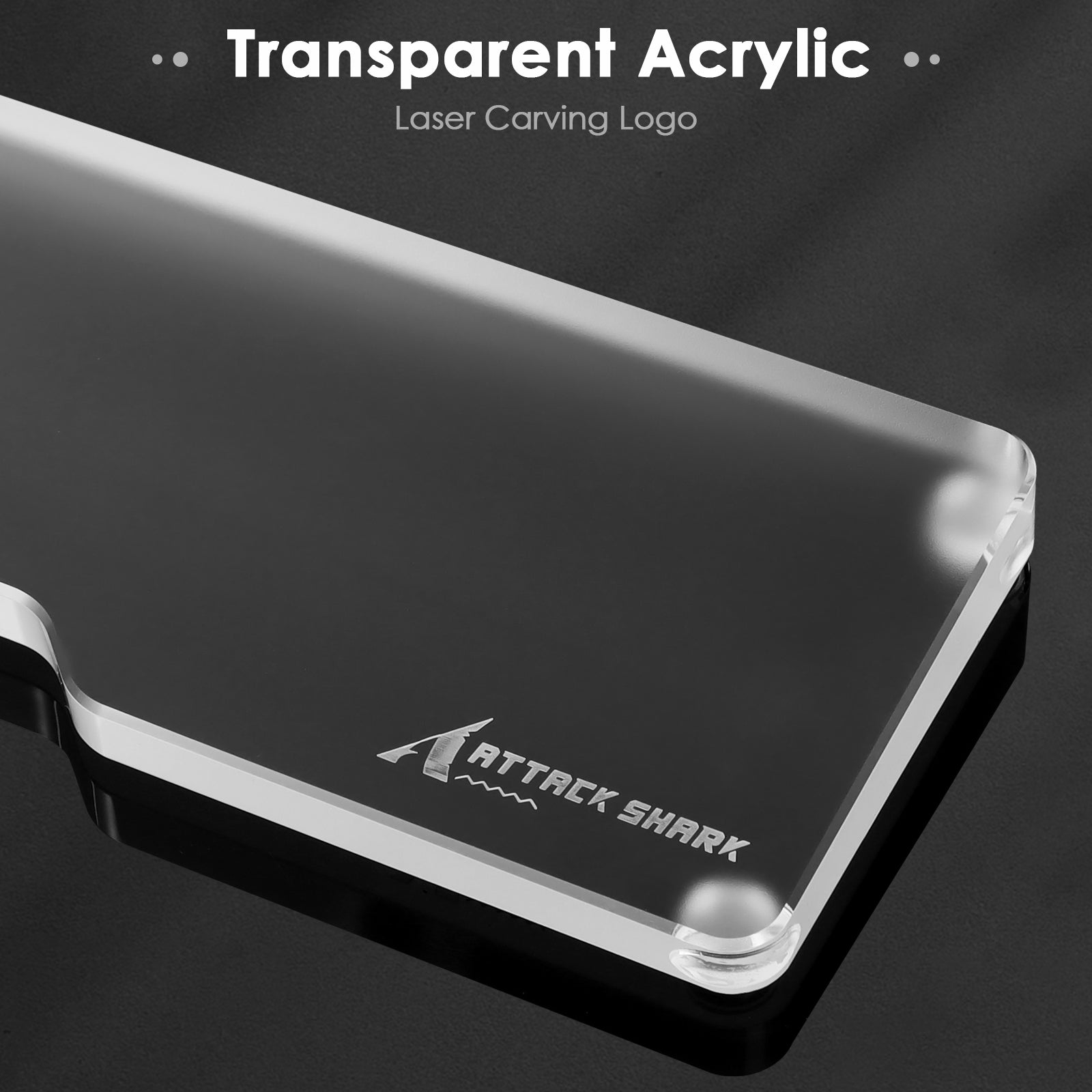Close-up of Attack Shark acrylic wrist rest showcasing laser-etched logo