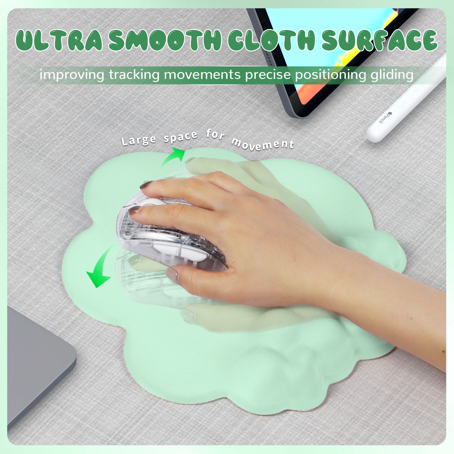 Mint green cloud mouse pad providing smooth tracking space for a gaming mouse.