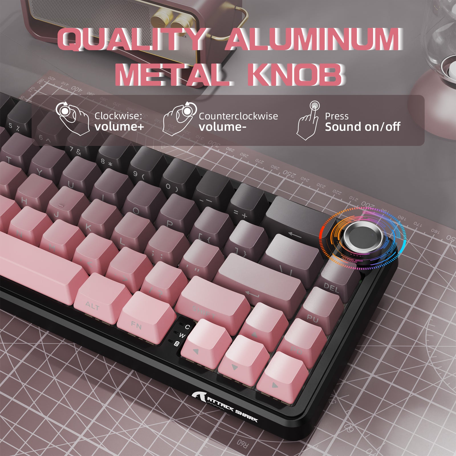 ATTACK SHARK X66 mechanical keyboard with aluminum knob, pink keycaps, and volume control functionality.