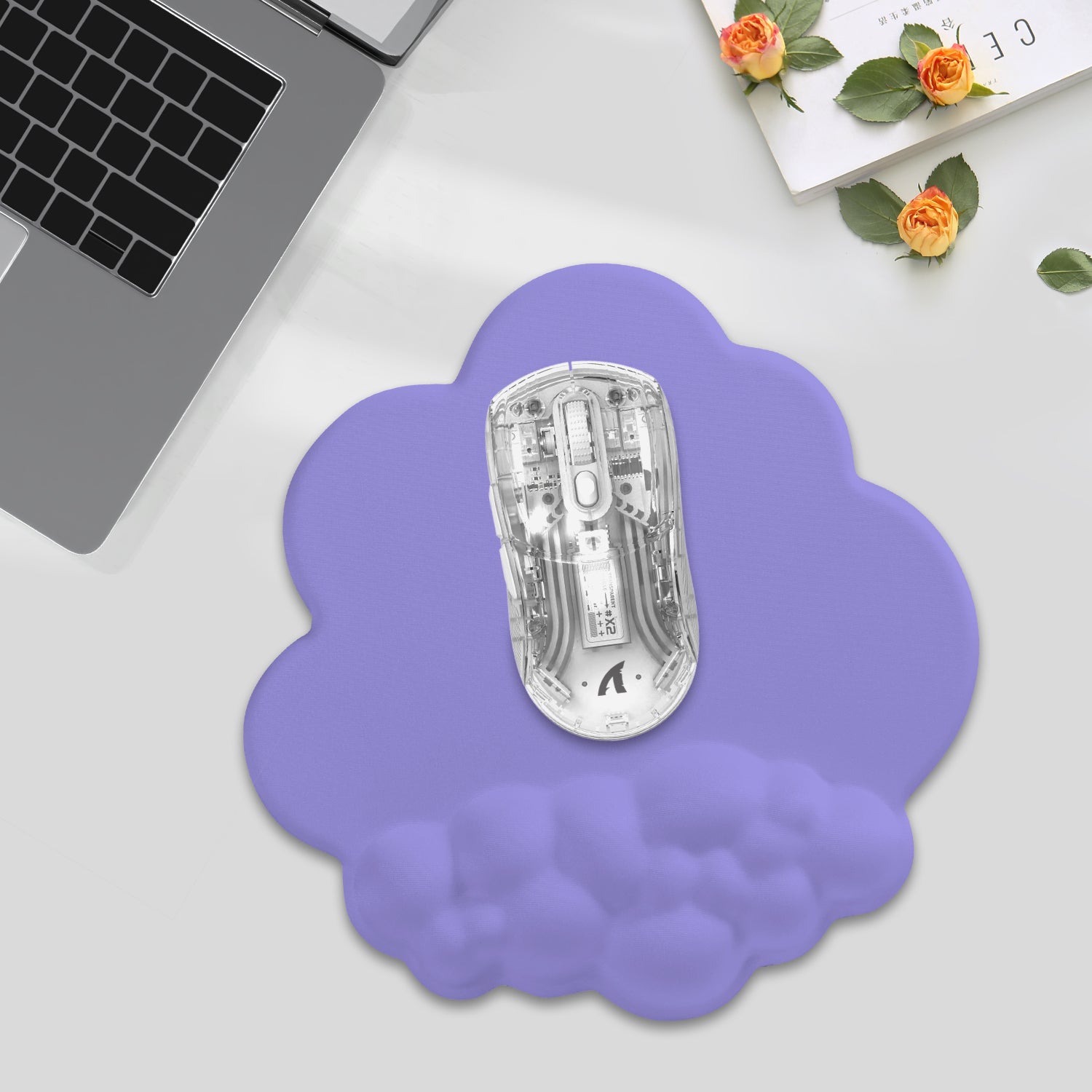 Purple cloud mouse pad with ergonomic wrist rest and gaming mouse for precise tracking.